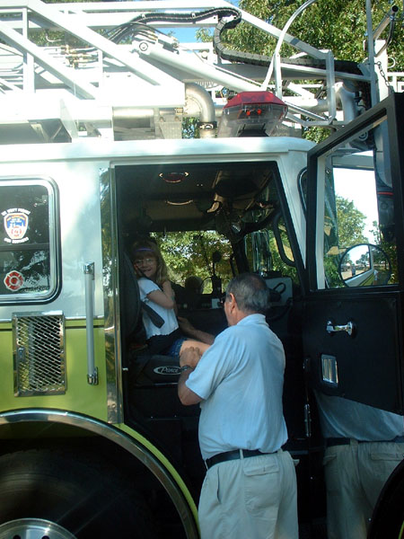 Alsatia and Jack in a fire truck.jpg 97.7K